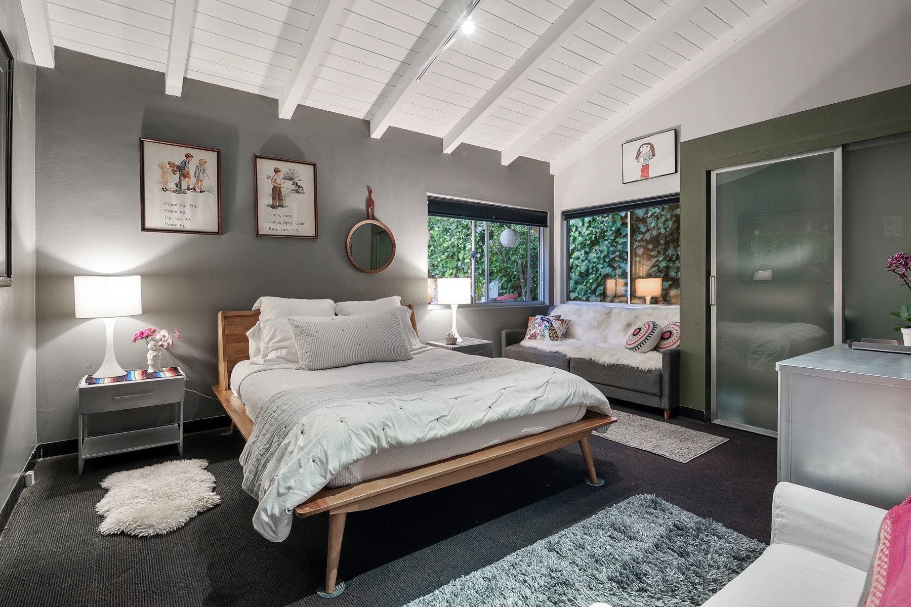 Bedroom two with a queen bed and sliding wardrobe