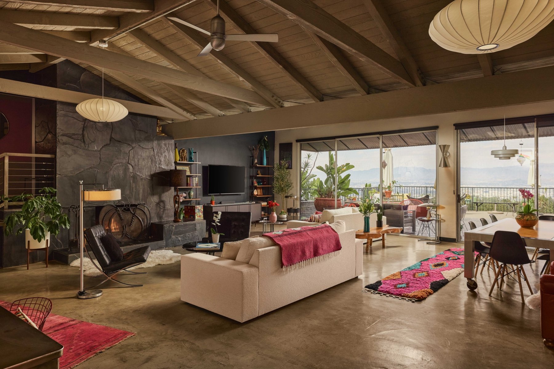 The spacious living room opening onto the view deck